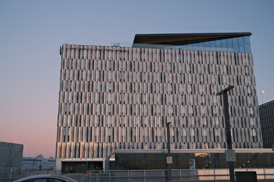 Hotels near Madrid airport — modern airport hotel exterior at dusk