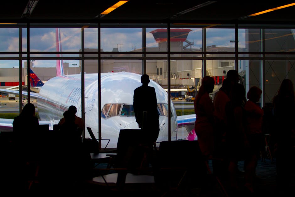 Hotels near Madrid airport — travelers at airport terminal