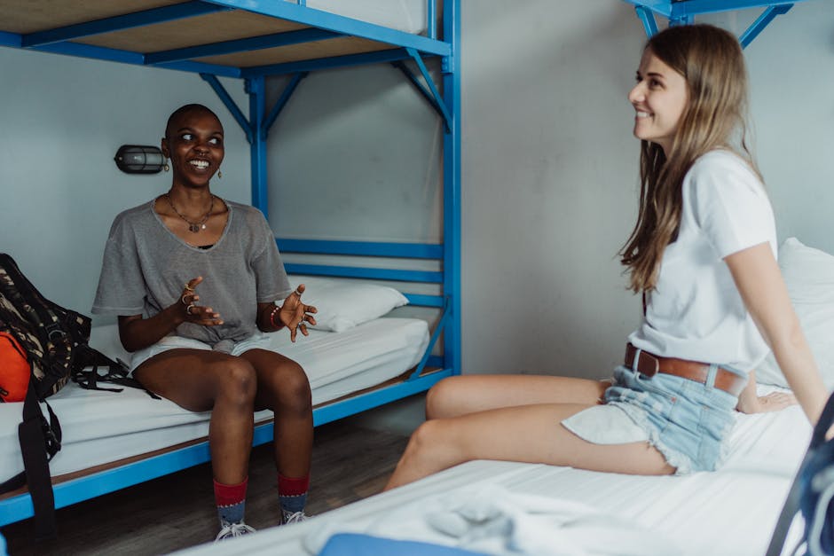 Best hostels in Madrid — travelers in cozy hostel common area