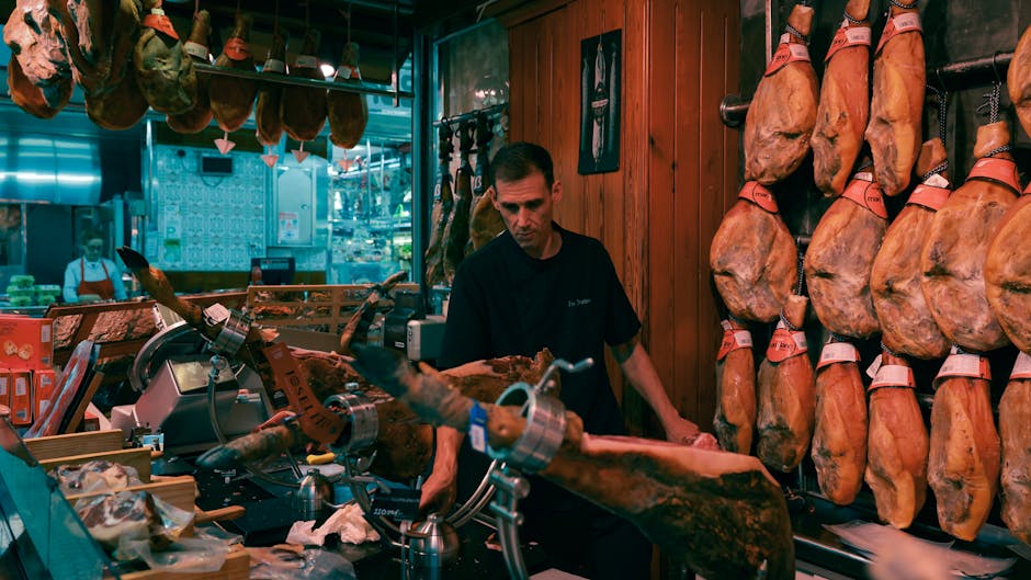 Jamón ibérico Madrid where to buy — cutting jamón at traditional shop