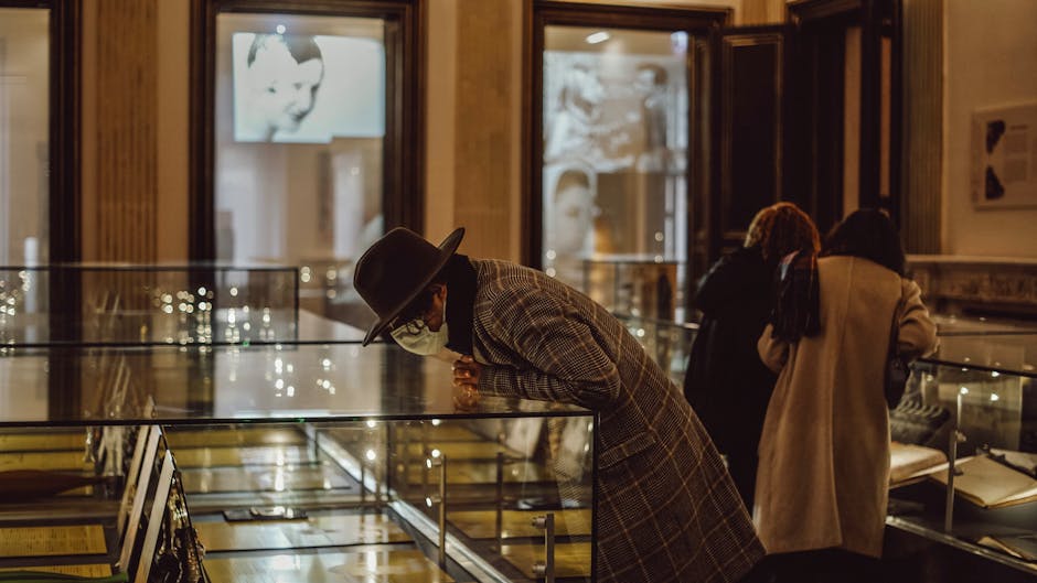 Free museum hours Madrid — visitors viewing museum exhibits