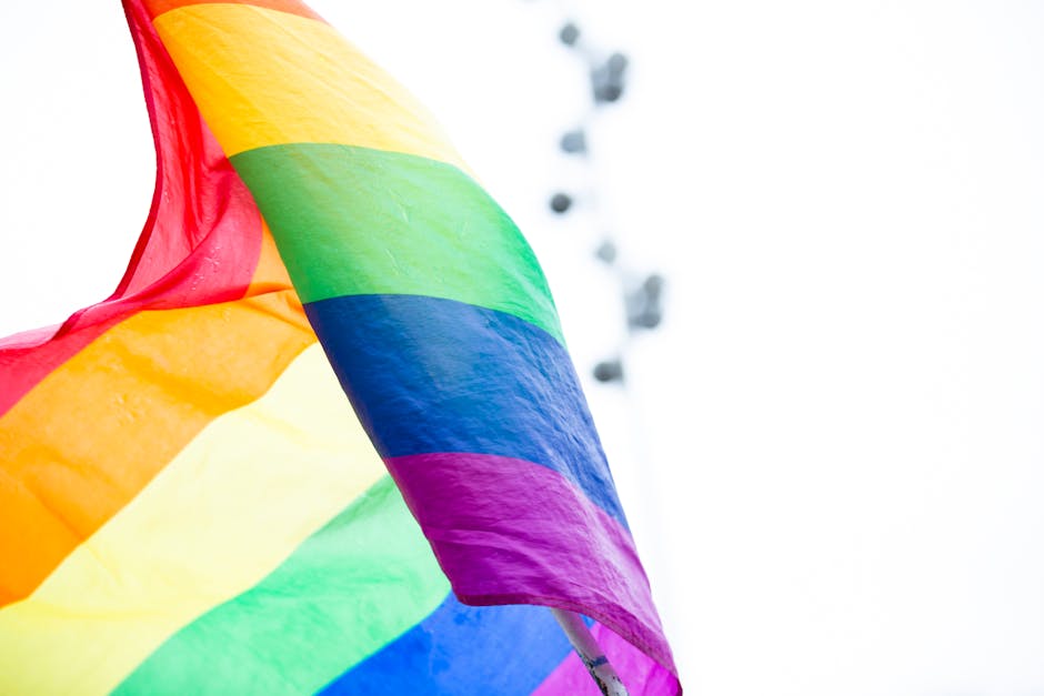 Stay in Chueca Madrid — rainbow pride flag waving