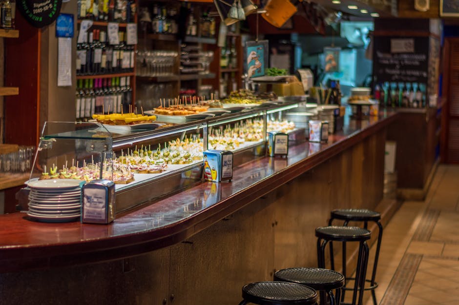 Tapas bars La Latina Madrid — vibrant tapas bar with pinchos display