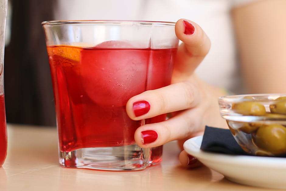 Vermouth bars Madrid — red vermouth aperitif glass with olive